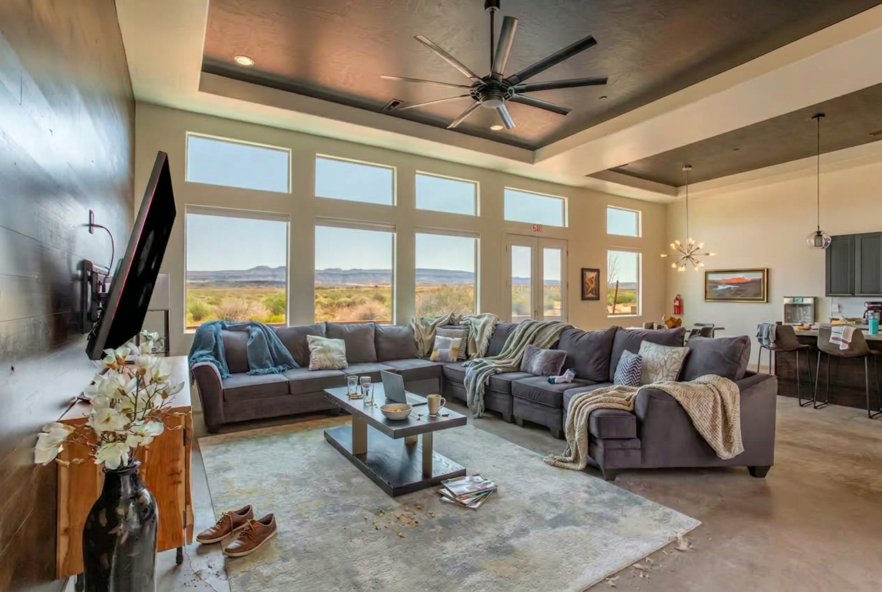 Family room with blankets and dishes out before a TrueCove cleaning in Santa Clara, Utah